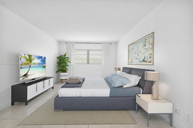 tiled bedroom with a textured ceiling