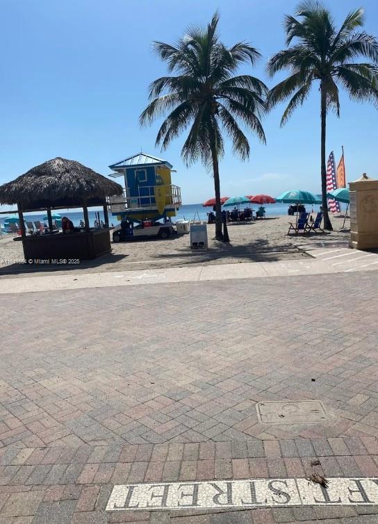 view of community featuring a gazebo and a water view