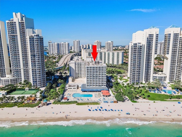 view of city featuring a view of the beach and a water view