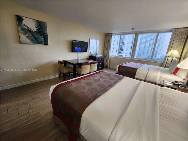 bedroom featuring hardwood / wood-style flooring