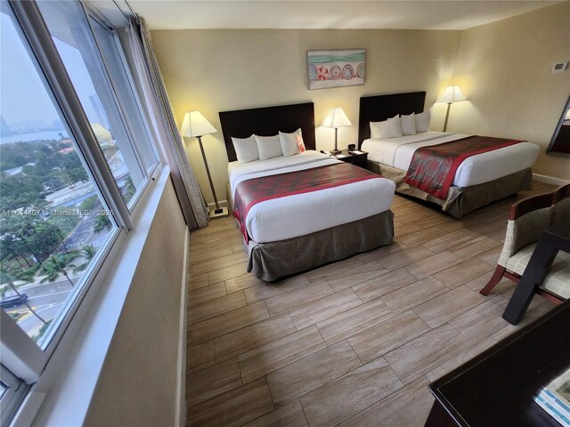 bedroom featuring hardwood / wood-style flooring