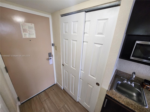 doorway to outside with sink