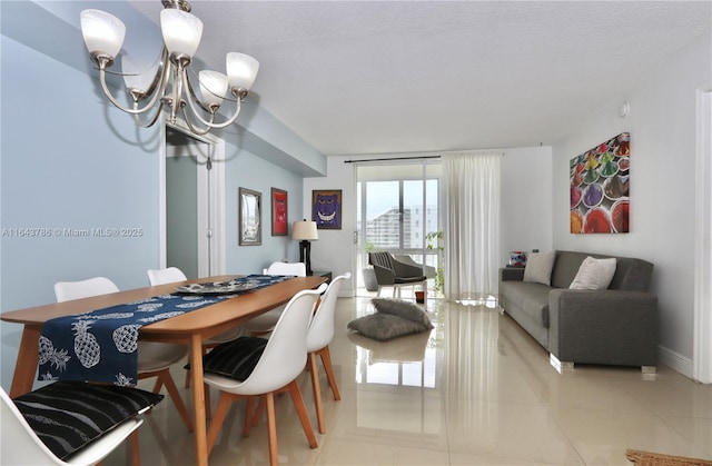 dining space featuring an inviting chandelier and light tile patterned floors