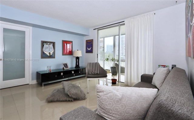 living room featuring light tile patterned flooring