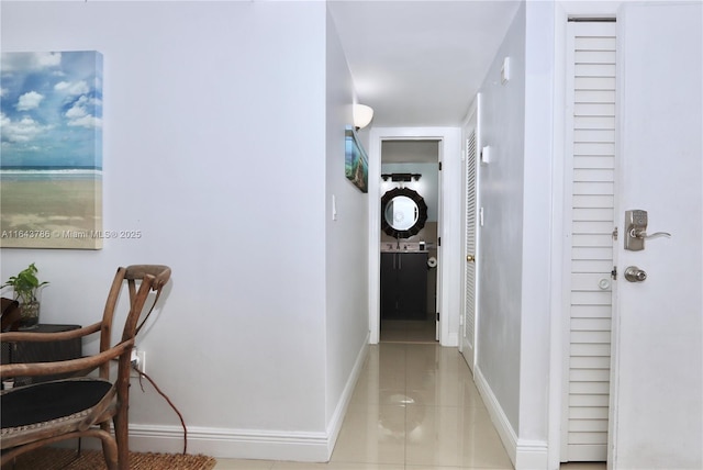 hallway featuring light tile patterned floors