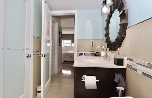 bathroom with vanity and tile patterned floors