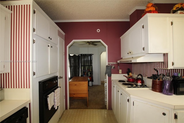 kitchen featuring ornamental molding, ceiling fan, light carpet, white cabinetry, and black appliances