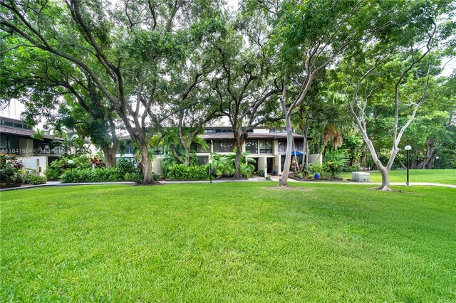 exterior space with a front lawn