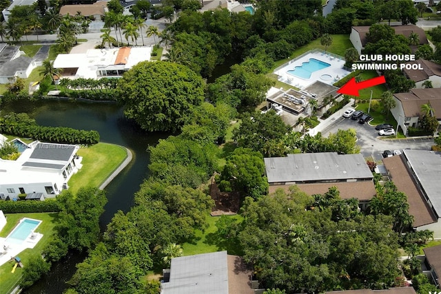 bird's eye view featuring a residential view and a water view