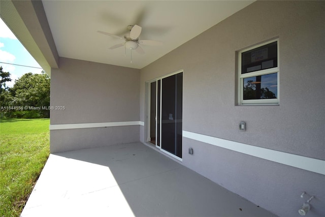 view of patio with ceiling fan