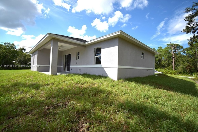 view of property exterior featuring a yard