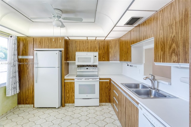 kitchen with ceiling fan, sink, and white appliances