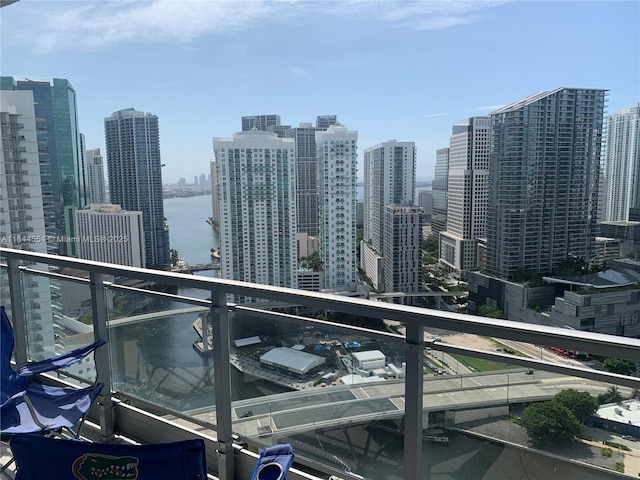 balcony featuring a water view