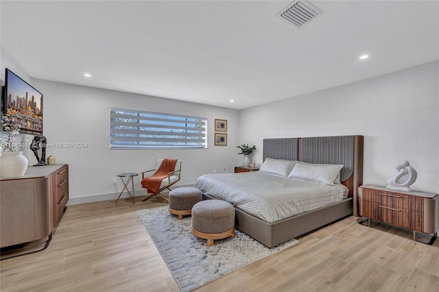 bedroom featuring light hardwood / wood-style flooring