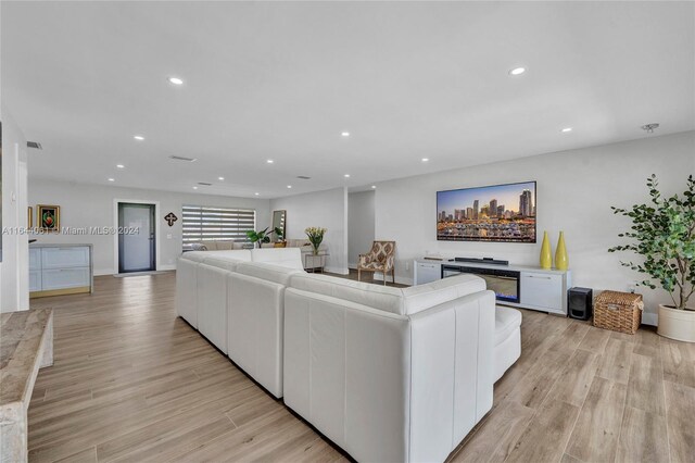 living room with light wood-type flooring