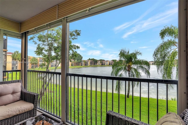 6219 Coral Lake Dr Unit 207, Margate, FL 33063 - sunroom / solarium featuring a water view