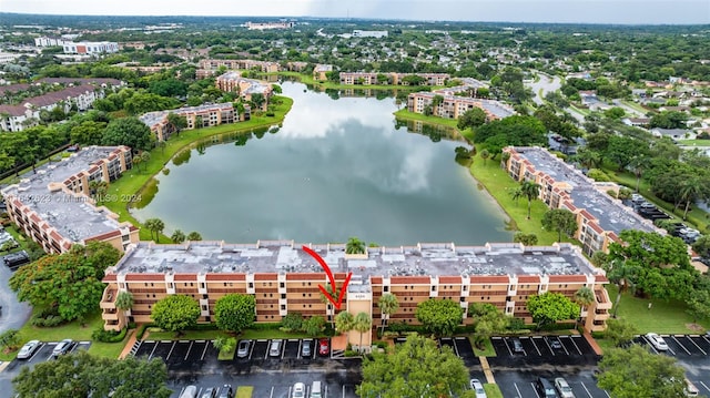 drone / aerial view with a water view