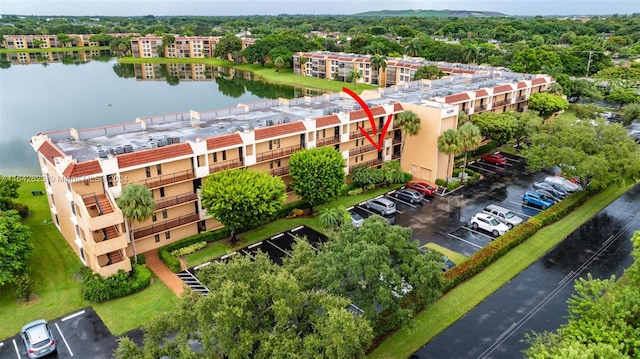 6219 Coral Lake Dr Unit 207, Margate, FL 33063 - birds eye view of property with a water view
