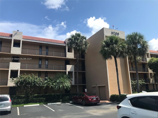 6219 Coral Lake Dr Unit 207, Margate, FL 33063 - view of property featuring uncovered parking