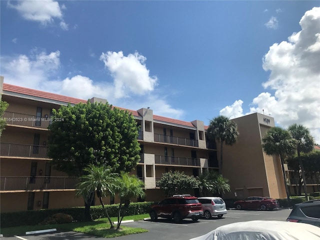 6219 Coral Lake Dr Unit 207, Margate, FL 33063 - view of property featuring uncovered parking