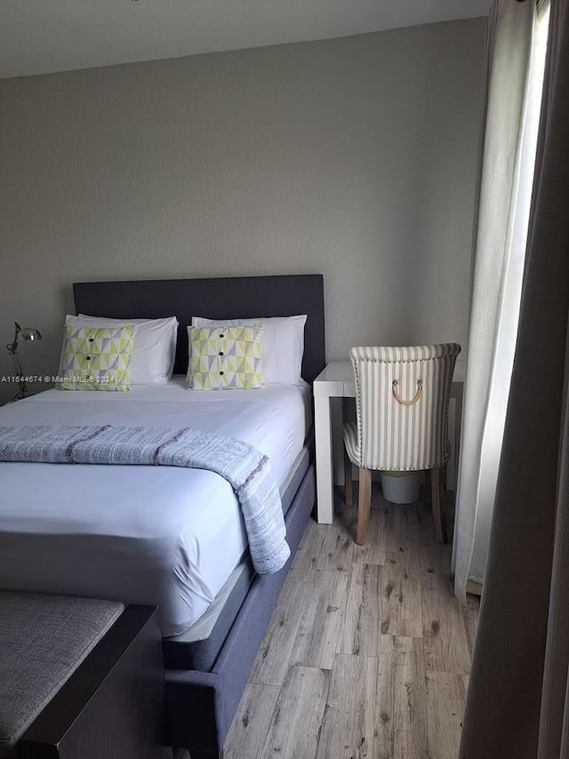 bedroom featuring light hardwood / wood-style flooring