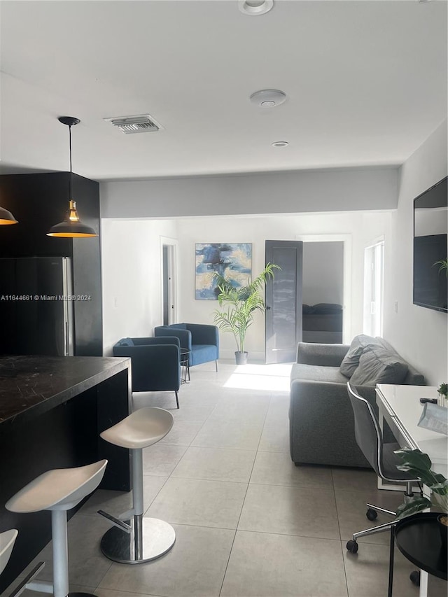 interior space featuring light tile patterned floors