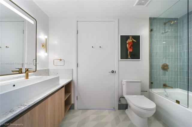 full bathroom featuring shower / bath combination with glass door, vanity, and toilet