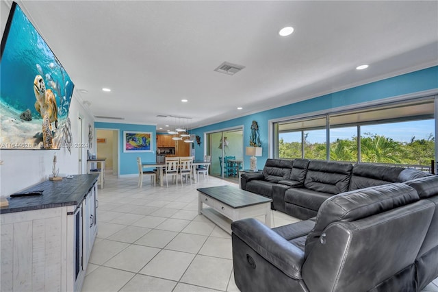 tiled living room featuring crown molding