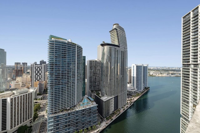 property's view of city with a water view