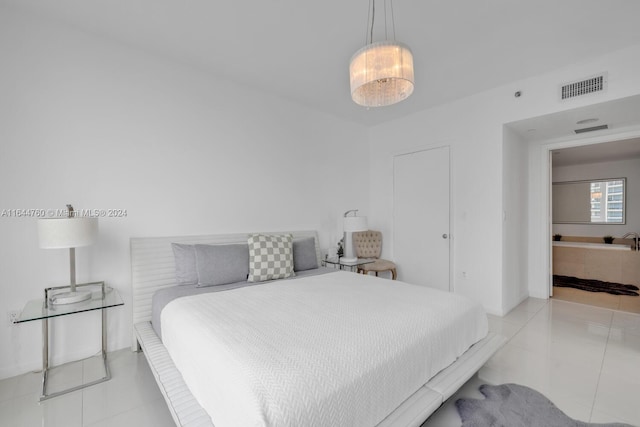 bedroom with light tile patterned flooring