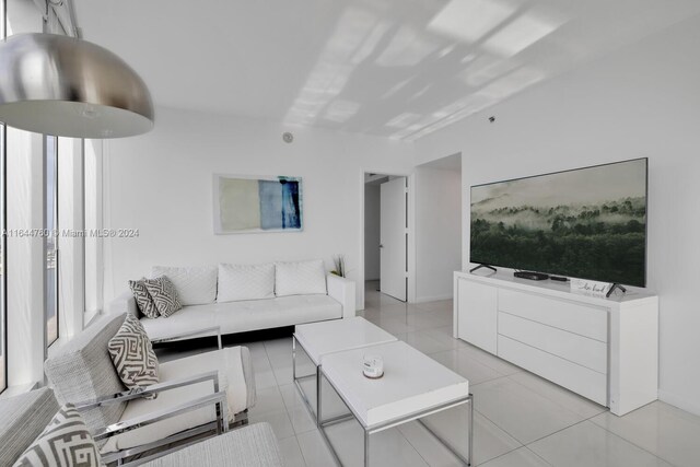 living room featuring light tile patterned floors