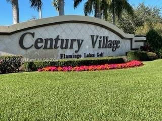 community sign with a lawn