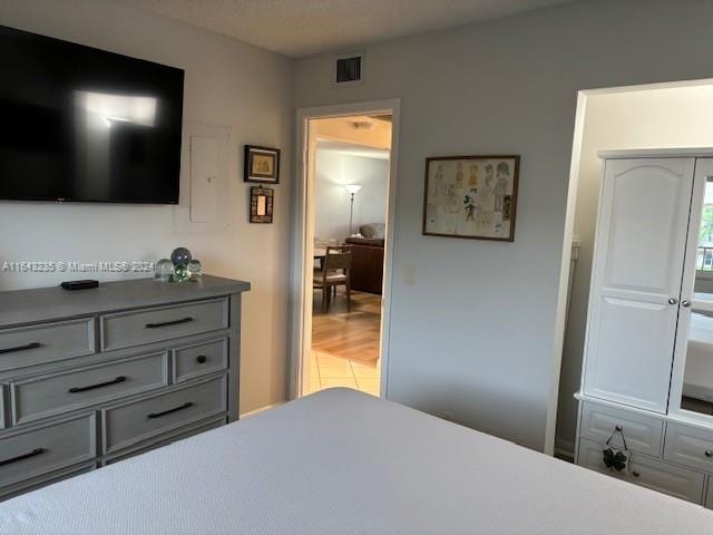 bedroom featuring wood-type flooring