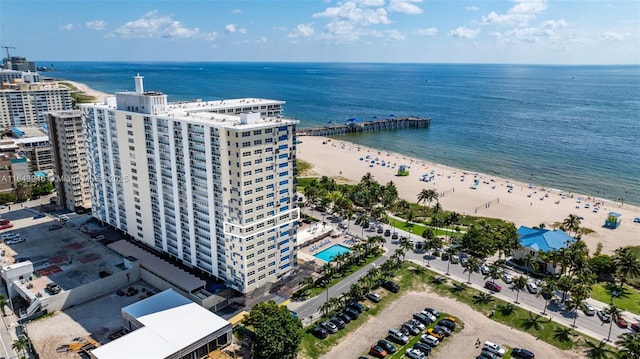 bird's eye view with a beach view and a water view