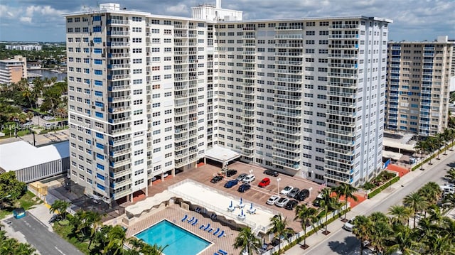 bird's eye view with a water view and a view of the beach