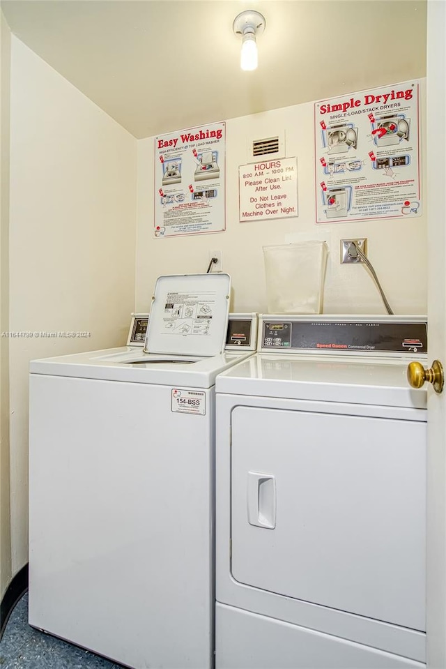 washroom featuring separate washer and dryer