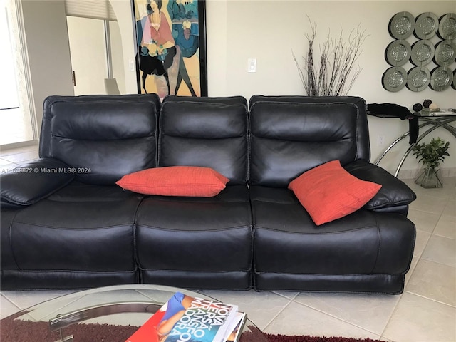 living room with tile patterned floors