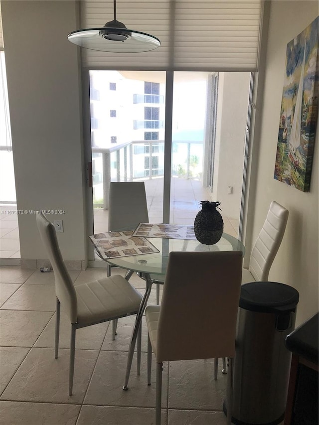 dining room with tile patterned flooring