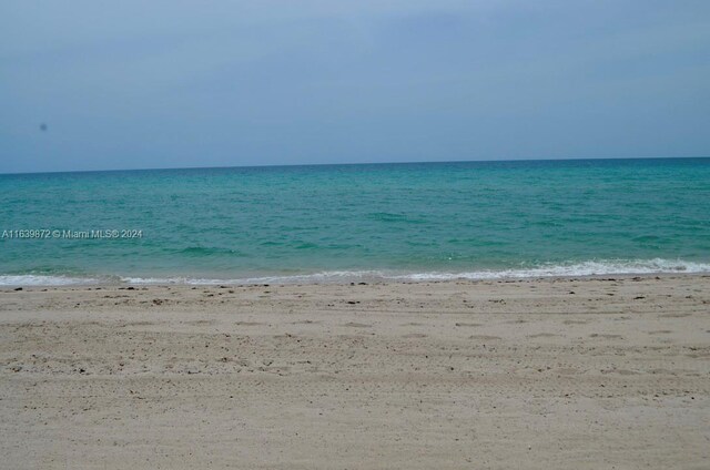 view of water feature featuring a beach view