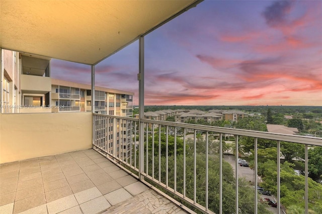 view of balcony at dusk