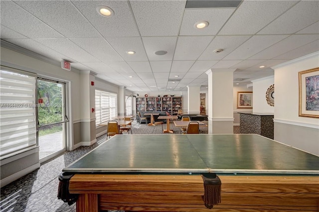 rec room featuring a drop ceiling, decorative columns, ornamental molding, and pool table