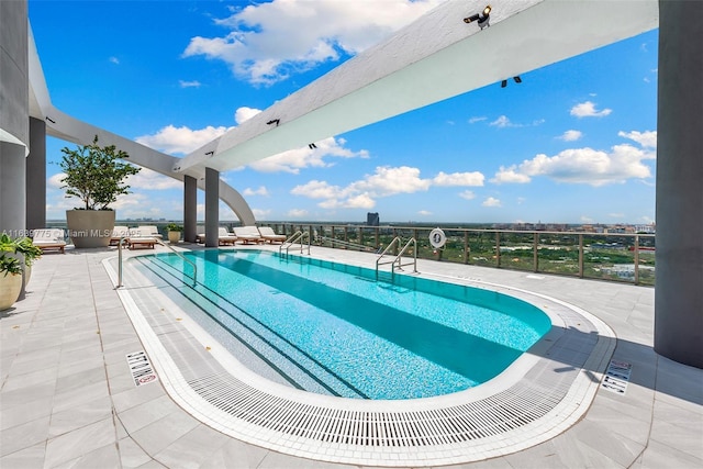 view of pool with a patio