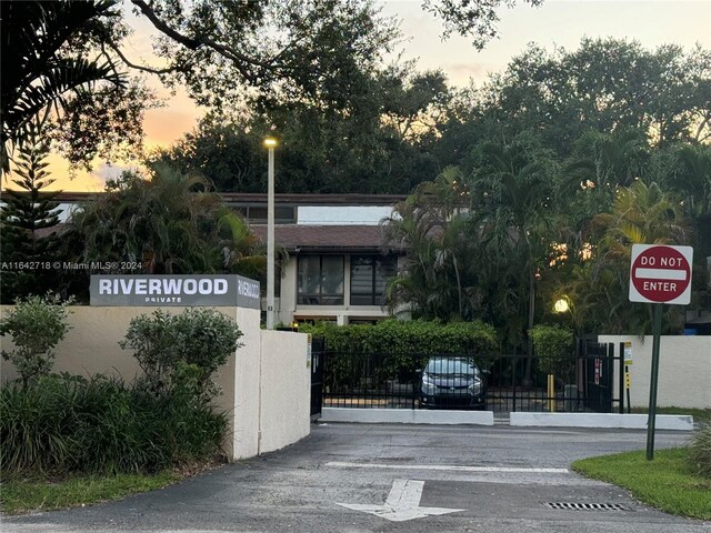 view of outdoor building at dusk