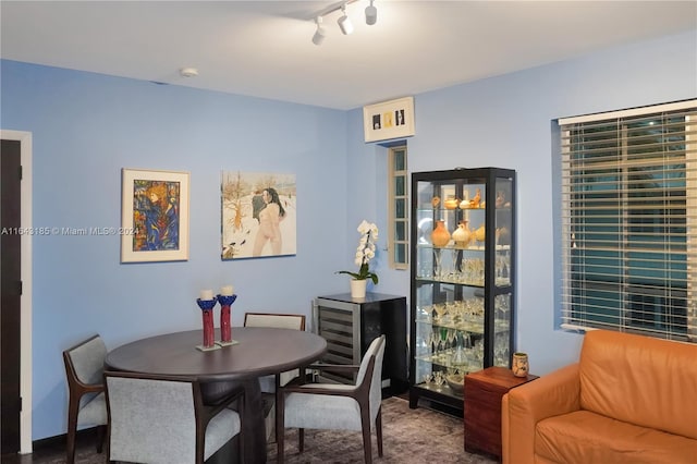 dining room featuring track lighting