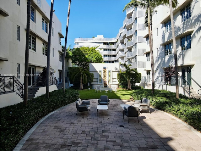 view of community with a patio area