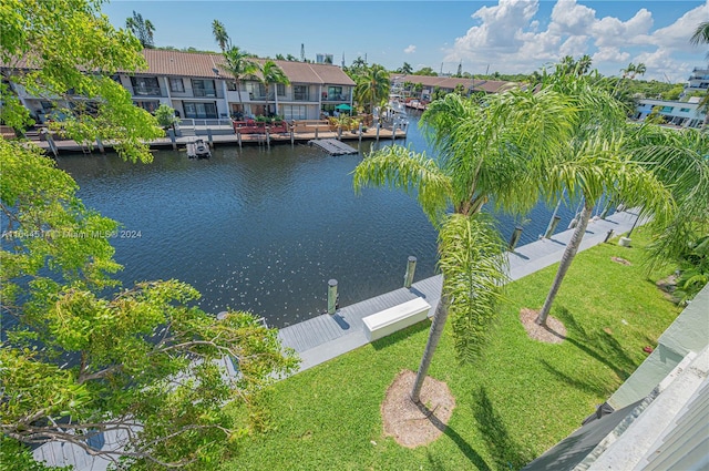 birds eye view of property featuring a water view