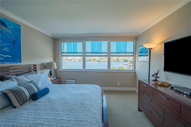 carpeted bedroom featuring ornamental molding