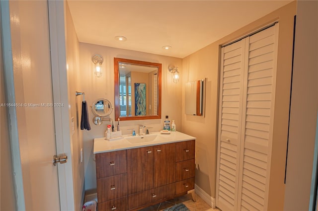 bathroom with vanity and tile patterned floors