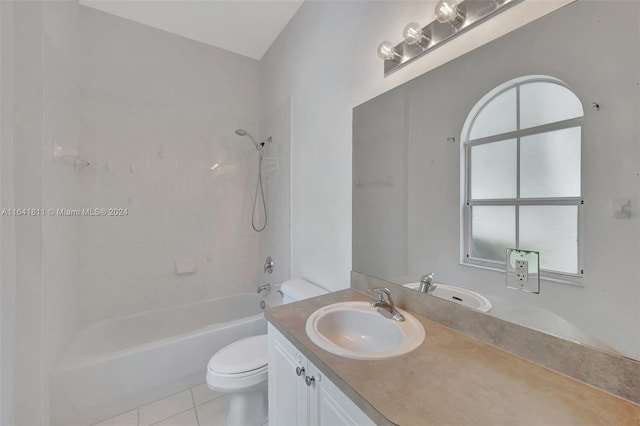 full bathroom with tile patterned flooring, vanity, bathing tub / shower combination, and toilet