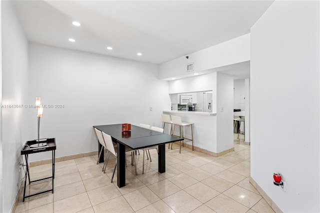 playroom featuring light tile patterned floors